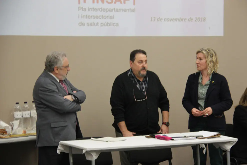 Pla mitj&radic;&dagger; del secretari de Salut P&radic;&int;blica, Joan Guix, l'alcalde de Coll de Narg&radic;&ge;, Mart&radic;&ne; Riera, i la delegada del Govern a l'Alt Pirineu i Aran, Rosa Amor&radic;&ge;s, durant el Consell de Salut P&radic;&int;blica de l'Alt Pirineu i Aran, el 13 de novembre de 2018 (Horitzontal)