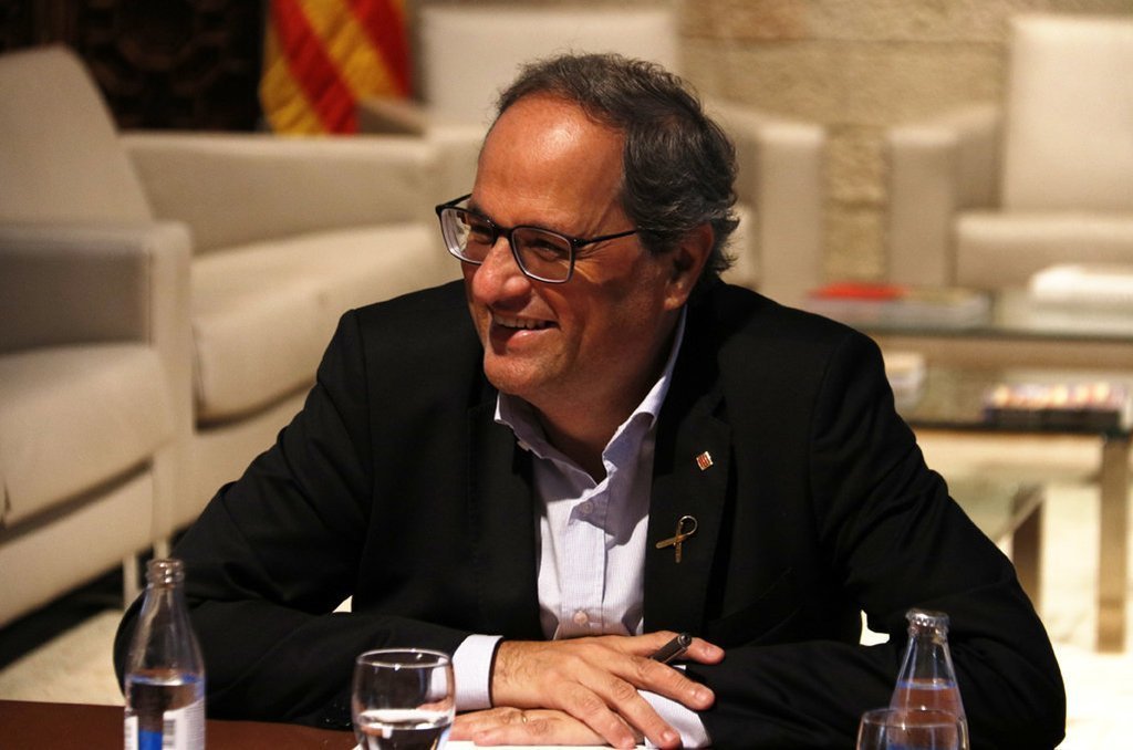 Pla mitj√† del president de la Generalitat, Quim Torra, somrient el 4 de juliol de 2019 (Horitzontal)