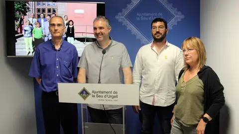 Pla americ&agrave; de l'alcalde de la Seu d'Urgell, Jordi F&agrave;brega, i el vicealcalde, Francesc Viaplana, presentant el cartip&agrave;s municipal amb els tinents d'alcalde Joan Gurrera i Marian Lamolla, el 9 de juliol de 2019 (Horitzontal).