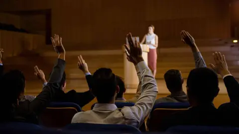 female-business-executive-giving-speech(1)